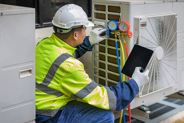 Professional Ductwork Repair technician working in Millis, MA